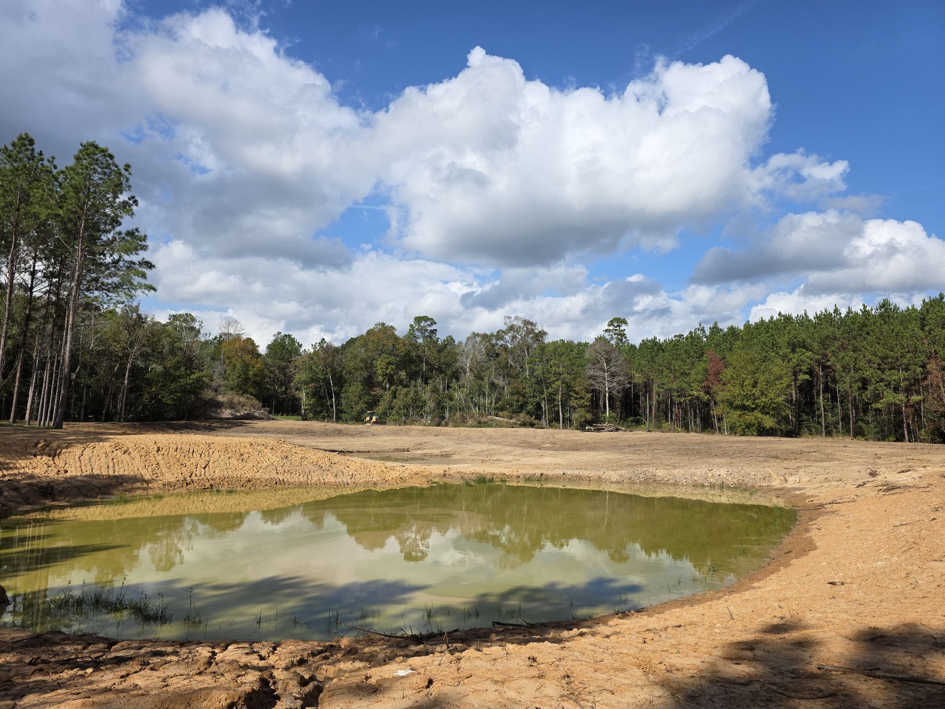 Excavated Basin To Finished Pond after